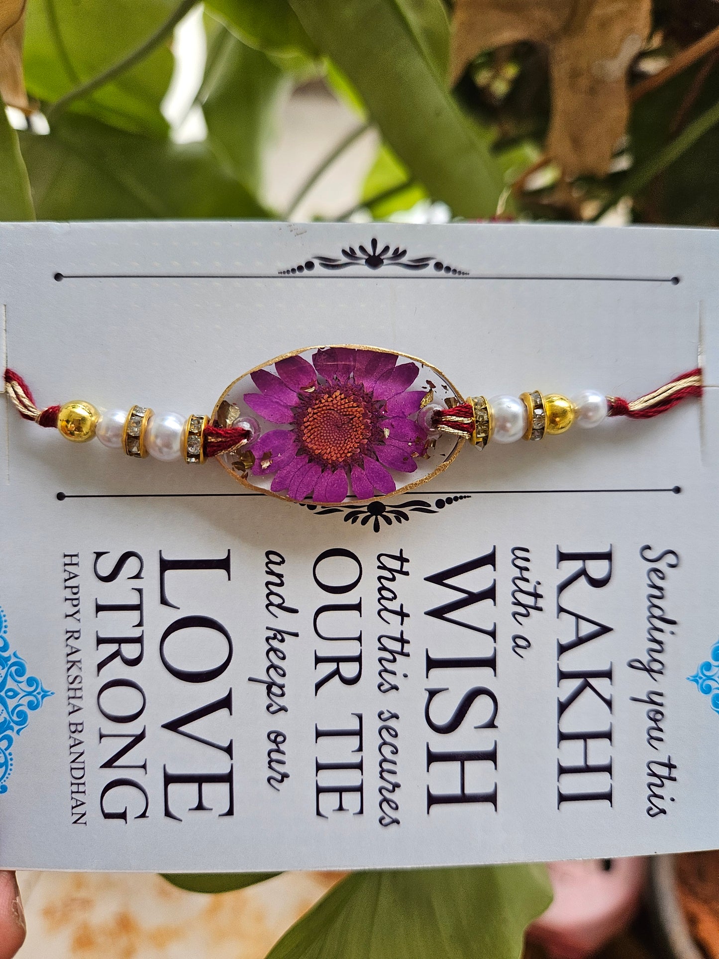 Violet Bloom Rakhi - Perfect for Raksha Bandhan 2024 | Unisex Purple Daisy Rakhi | Real Flower Jewellery | Elnorah Jewellery